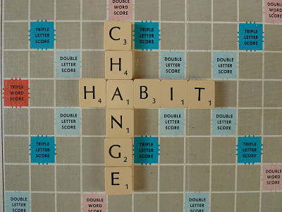 Habit and change spelled with Scrabble