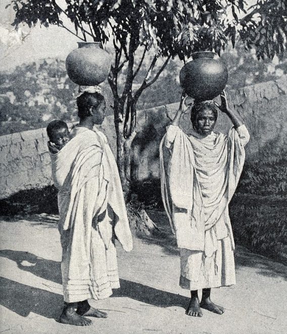 Malagasy women carrying water