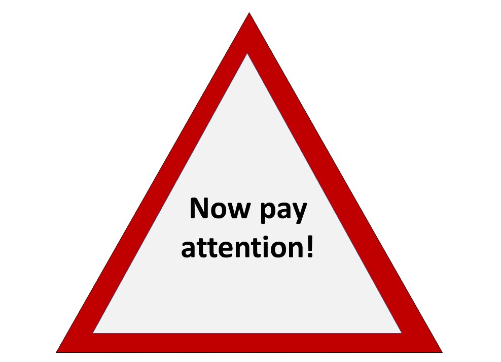 Road sign image with words 'Now pay attention!'