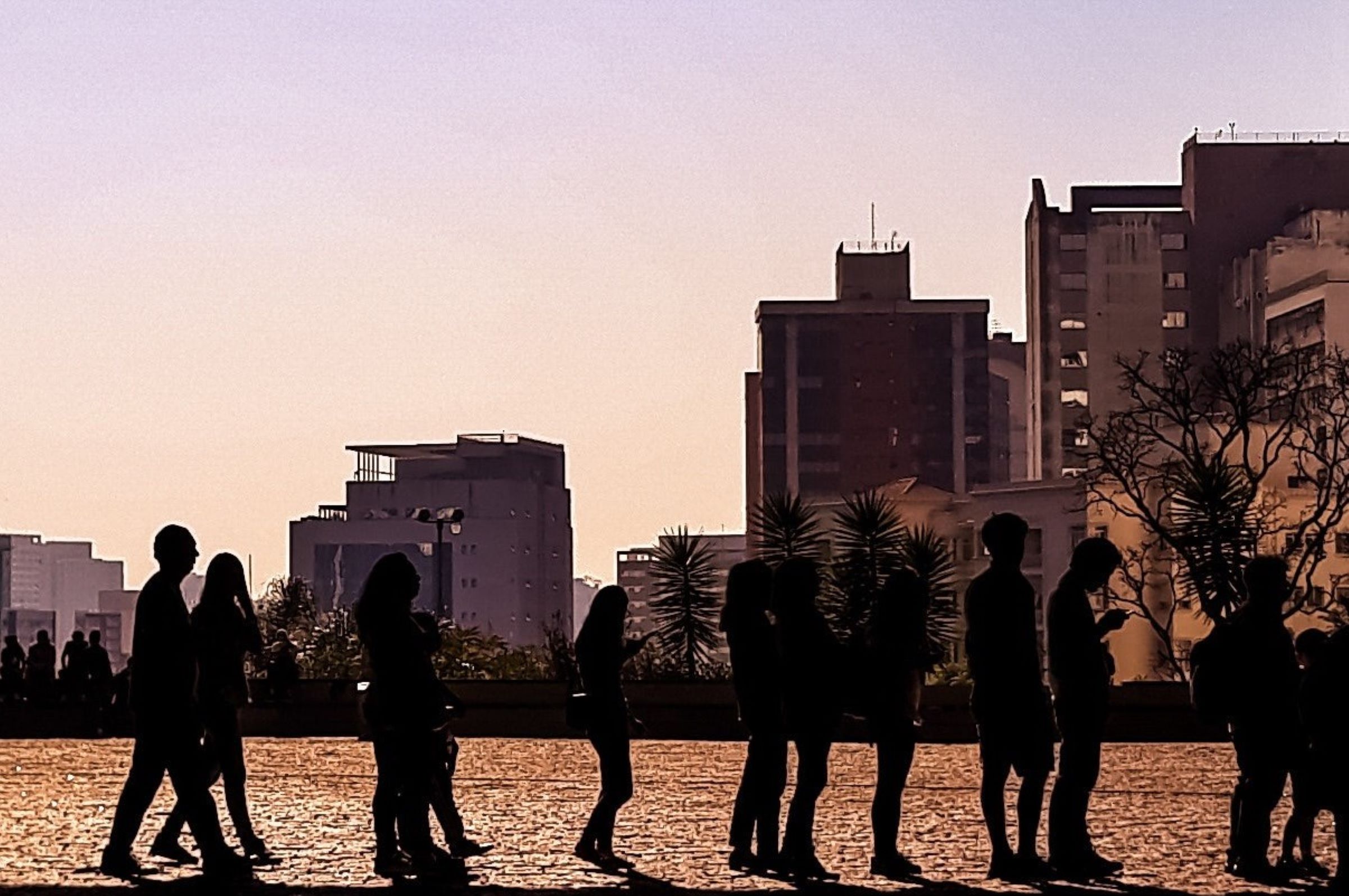 People standing waiting in a queue