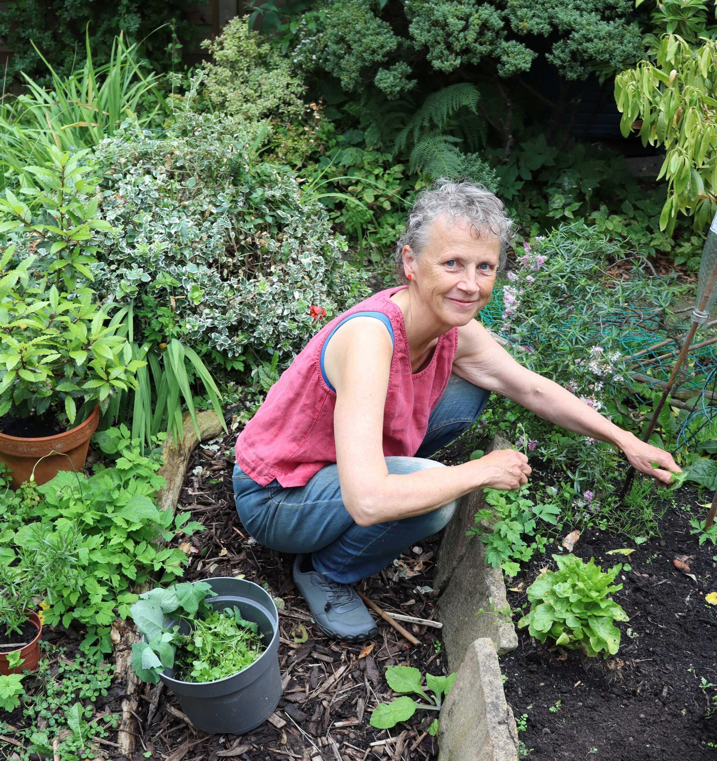 Photo of me weeding in my garden