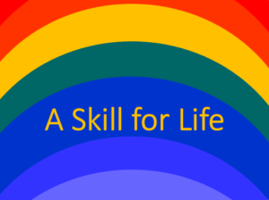 Image with the phrase 'A skill for life' on a rainbow coloured background